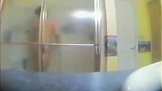 A girl took a shower, not knowing there was a hidden camera
