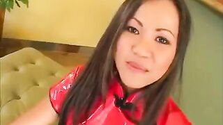 The cute Korean girl makes a blowjob to two guys together