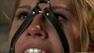 A beautiful woman is tied up and roughly fucked