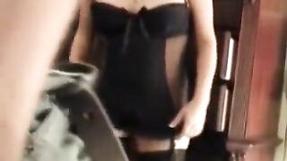 A hot wife fucks with her husband wearing a sexy corset