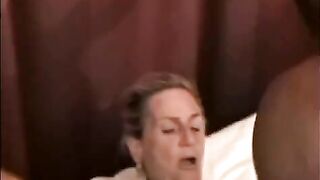 A mature woman is having sex with a black man’s huge cock