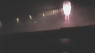 A sexy woman was exercising outdoors when a strange guy approached her