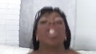 A black girl got a white guy's cock in her mouth