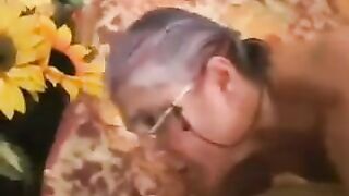 A man had sex with a gray-haired woman wearing black stockings