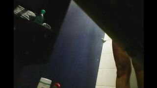 There is a camera in the shower and it films a girl's shaved pussy