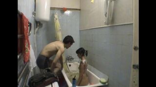 A girl has sex with her stepbrother in the bathroom, captured in shocking detail