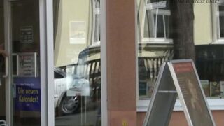 Girl without panties walks along the street and shows her ass
