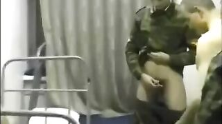 A chick is being fucked by soldiers in the crowd