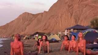 A group of nudists play volleyball on the nude beach in a hot HD scene