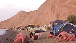 A group of nudists play volleyball on the nude beach in a hot HD scene