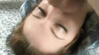 The girl gently holds the guy’s dick in her mouth very deep
