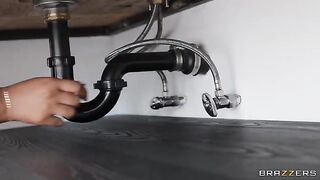 The beautiful woman met a black-skinned plumber who was very handsome