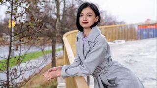 A cute little brunette gets fucked on the city streets