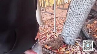 A married couple enjoys passionate sex while taking a walk in the park