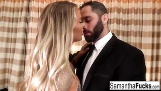 A busty blonde is having fun in the hotel room