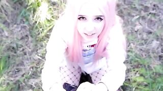 A pretty girl with pink hair sucks cock, showcasing her passion