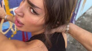 A girl gets fucked in the street by a stranger, showcasing Sisi Rose’s daring side