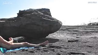 A girl removes her swimsuit and rubs herself while her friend jerks off