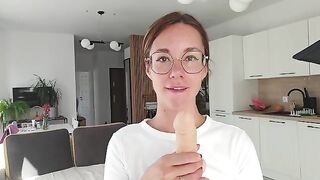 A girl has a discharge and talks dirty on camera