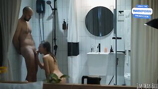 The shower stall is cramped, but it's just right for the two of them to explore their passion