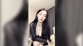A girl in pink panties plays with a dildo and orders you to lick