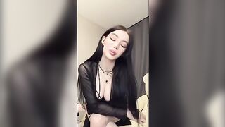 A girl in pink panties plays with a dildo and orders you to lick