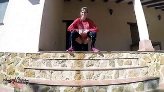 A sexy girl with a full bladder walking around looking for a place to pee